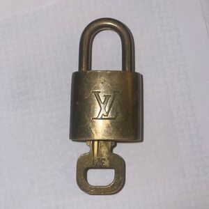 Authentic Louis Vuitton lock and key